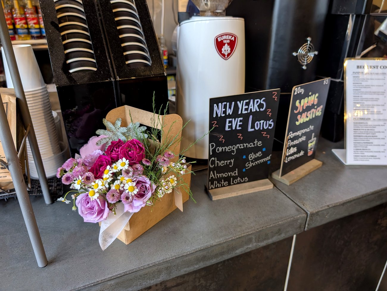 Bloom & Drink — spring coffee shop floral collaboration with mauve roses and chamomile
